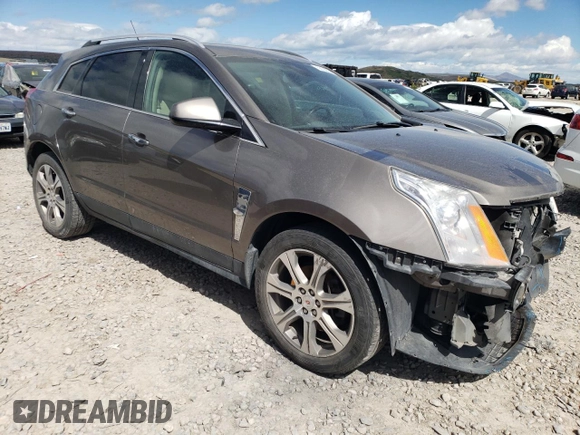 2012 Cadillac SRX Performance Collection with VIN 3GYFNEE34CS589833, listed as a Copart auction lot 56138324 with Not provided miles and Salvage title. Bid and sale history available at DreamBid. Image 4.