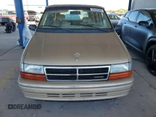 1991 Dodge Caravan z VIN 1B4GD54R1MX553940, wystawiony jako Copart lot #59332594 z przebiegiem 110 858 mil mil oraz Szkody całkowita. Historia ofert i sprzedaży dostępna na DreamBid. Obrazek 5.