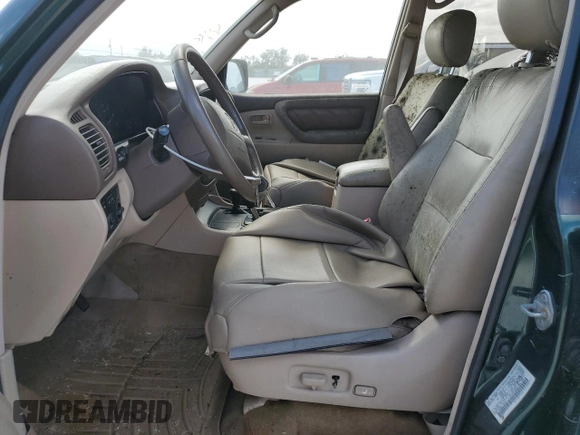 1999 Toyota Land Cruiser with VIN JT3HT05J9X0027448, listed as a Copart auction lot 77175814 with 0 mi miles and Salvage Title. Bid and sale history available at carsss.com. Image 7.