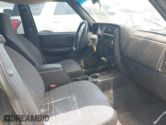 2001 Jeep Cherokee Sport with VIN 1J4FF48S31L601063, listed as a IAAI auction lot 42302200 with 251,308 mi miles and . Bid and sale history available at DreamBid. Image 5.