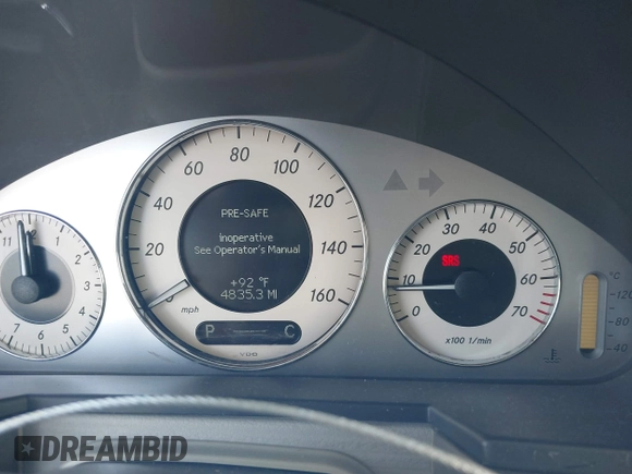 2005 Mercedes-Benz E-Class 3.2L with VIN WDBUF65J05A634879, listed as a IAAI auction lot 39904592 with 4,835 mi miles. Bid and sale history available at carsss.com. Image 7.
