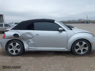 2013 Volkswagen Beetle Convertible 2.5L with VIN 3VW5X7AT0DM821473, listed as a IAAI auction lot 41103124 with 112,953 mi miles. Bid and sale history available at carsss.com. Image 13.