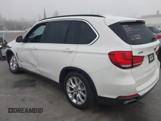2016 BMW X5 xDrive40e with VIN 5UXKT0C59G0S79593, listed as a IAAI auction lot 41846666 with 57,178 mi miles and . Bid and sale history available at DreamBid. Image 14.