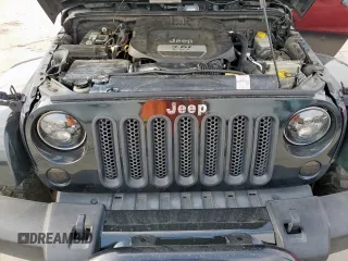 2012 Jeep Wrangler Unlimited Altitude with VIN 1C4HJWEGXCL180602, listed as a Copart auction lot 61391095 with 187,205 mi miles and Salvage title. Bid and sale history available at DreamBid. Image 12.