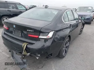 2021 BMW 3 Series 330i with VIN 3MW5R1J07M8B89836, listed as a IAAI auction lot 41860987 with 39,247 mi miles. Bid and sale history available at carsss.com. Image 4.