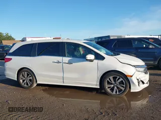 2022 Honda Odyssey Touring with VIN 5FNRL6H85NB058948, listed as a IAAI auction lot 42579157 with 53,669 mi miles and . Bid and sale history available at DreamBid. Image 13.