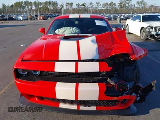 2021 Dodge Challenger R/T Scat Pack z VIN 2C3CDZFJ9MH637240, wystawiony jako IAAI lot #41411595 z przebiegiem 13 175 mil mil oraz . Historia ofert i sprzedaży dostępna na DreamBid. Obrazek 13.