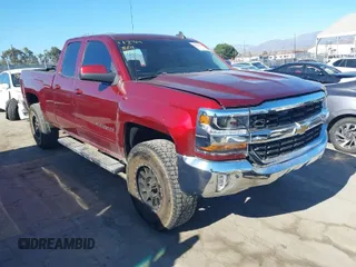 2017 Chevrolet Silverado 1500 LT with VIN 1GCRCREC0HZ171084, listed as a IAAI auction lot 40142848 with 137,420 mi miles and . Bid and sale history available at DreamBid. Image 1.