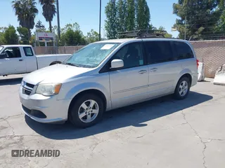 2012 Dodge Grand Caravan SXT with VIN 2C4RDGCG2CR223891, listed as a IAAI auction lot 42189650 with 119,669 mi miles and . Bid and sale history available at DreamBid. Image 2.