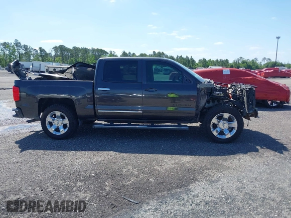 2014 Chevrolet Silverado 1500 LTZ with VIN 3GCUKSEC8EG536076, listed as a IAAI auction lot 41464408 with 133,418 mi miles and . Bid and sale history available at DreamBid. Image 13.