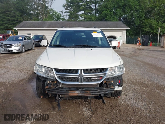 2013 Dodge Journey Crew with VIN 3C4PDCDG0DT591533, listed as a IAAI auction lot 42630548 with 164,961 mi miles and . Bid and sale history available at DreamBid. Image 12.