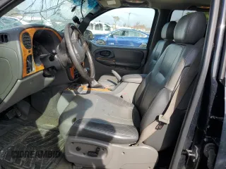 2003 Chevrolet TrailBlazer LTZ with VIN 1GNDT13S332196883, listed as a Copart auction lot 77031124 with 167,328 mi miles and Salvage Title. Bid and sale history available at DreamBid. Image 7.