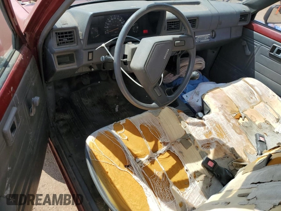 1988 Toyota Pickup с VIN JT4RN63A7J5038197, выставлен на аукционе Copart как лот 59910655 с пробегом 76 519 миль миль и Чистый • Clean title. История ставок и продаж доступна на DreamBid. Изображение 8.