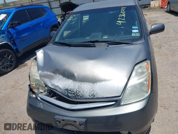 2007 Toyota Prius z VIN JTDKB20U073245052, wystawiony jako IAAI lot #42368508 z przebiegiem 116 953 mil mil oraz . Historia ofert i sprzedaży dostępna na DreamBid. Obrazek 10.