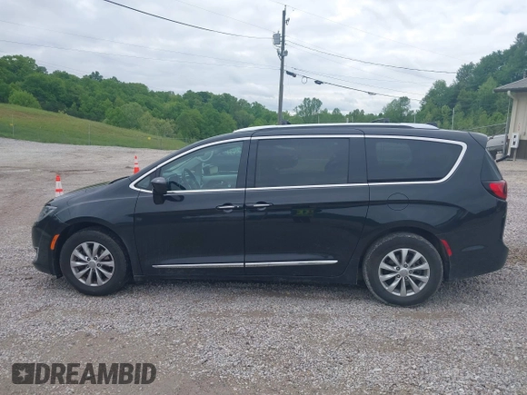 2018 Chrysler Pacifica Touring L z VIN 2C4RC1BG8JR262158, wystawiony jako IAAI lot #42182431 z przebiegiem 65 890 mil mil oraz . Historia ofert i sprzedaży dostępna na DreamBid. Obrazek 14.