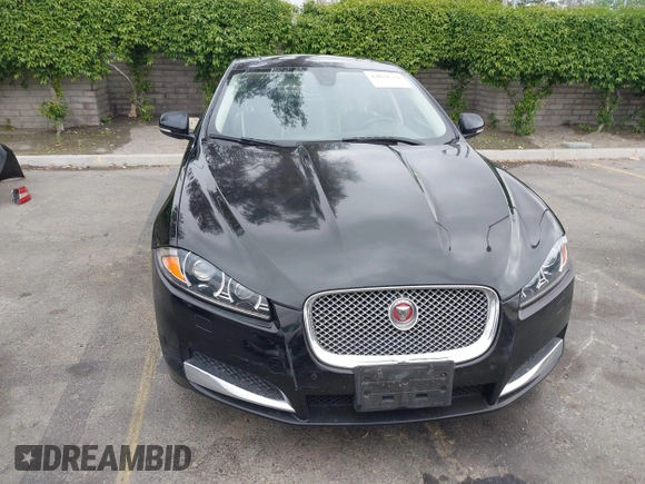 2015 Jaguar XF V6 Portfolio with VIN SAJWA0F77F8U65737, listed as a IAAI auction lot 42078529 with 62,229 mi miles. Bid and sale history available at carsss.com. Image 13.