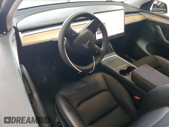2023 Tesla Model Y Long Range with VIN 7SAYGDEE8PF758841, listed as a Copart auction lot 62851164 with 16,811 mi miles and Non Repairable. Bid and sale history available at DreamBid. Image 8.