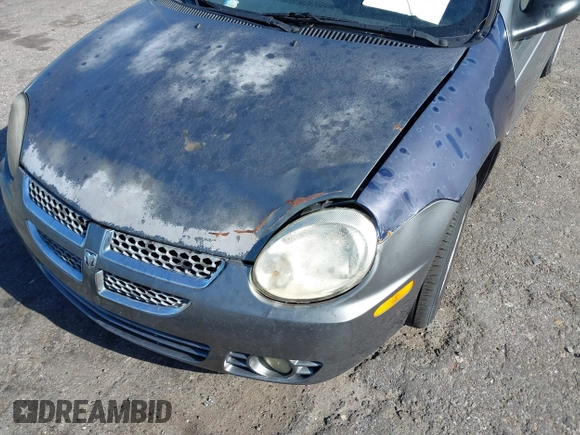 2005 Dodge Neon SXT z VIN 1B3ES56C05D119361, wystawiony jako IAAI lot #42132604 z przebiegiem Nie podano mil oraz . Historia ofert i sprzedaży dostępna na DreamBid. Obrazek 6.