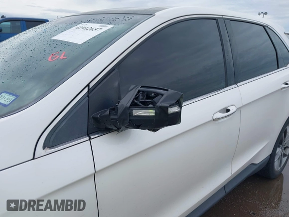 2015 Ford Edge Titanium z VIN 2FMTK3K82FBC42299, wystawiony jako IAAI lot #41912657 z przebiegiem 198 144 mil mil oraz . Historia ofert i sprzedaży dostępna na DreamBid. Obrazek 6.