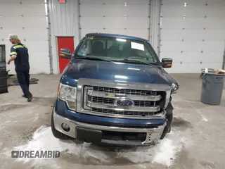 2014 Ford F-150 XL with VIN 1FTFW1EF7EKG57692, listed as a IAAI auction lot 41996378 with 111,113 mi miles. Bid and sale history available at carsss.com. Image 12.
