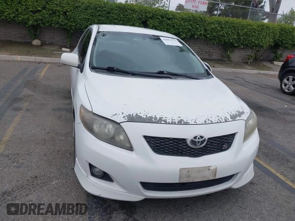2010 Toyota Corolla with VIN 1NXBU4EE5AZ240272, listed as a IAAI auction lot 42063570 with 230,612 mi miles. Bid and sale history available at carsss.com. Image 12.