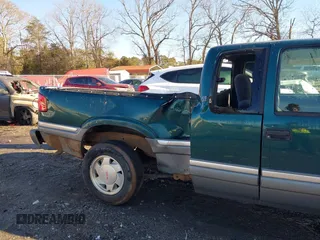 1998 GMC Sonoma SLS with VIN 1GTCS19X7W8527833, listed as a IAAI auction lot 41427791 with 232,462 mi miles. Bid and sale history available at carsss.com. Image 6.