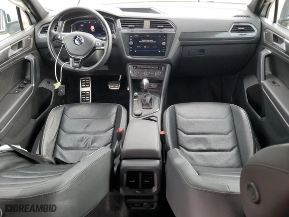 2020 Volkswagen Tiguan SEL Premium R-Line with VIN 3VV4B7AX8LM033024, listed as a Copart auction lot 77354494 with 127,247 mi miles and Salvage Title. Bid and sale history available at carsss.com. Image 8.