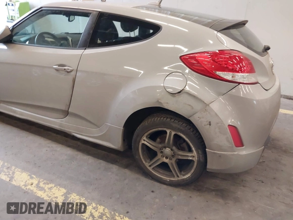 2013 Hyundai Veloster w/Black Int with VIN KMHTC6AD2DU128534, listed as a IAAI auction lot 41791398 with 158,414 mi miles and . Bid and sale history available at DreamBid. Image 6.
