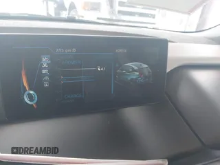 2014 BMW i3 with VIN WBY1Z4C57EV276127, listed as a IAAI auction lot 41531408 with 105,696 mi miles and . Bid and sale history available at DreamBid. Image 14.