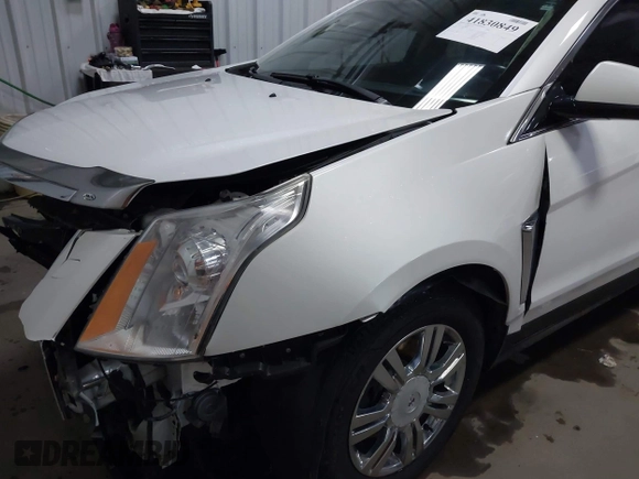 2014 Cadillac SRX Performance Collection with VIN 3GYFNFE36ES615440, listed as a IAAI auction lot 41830849 with 125,128 mi miles and . Bid and sale history available at DreamBid. Image 18.