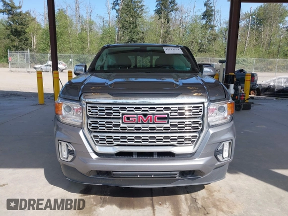 2021 GMC Canyon 4WD Denali with VIN 1GTG6EEN5M1102747, listed as a IAAI auction lot 42121134 with 60,412 mi miles and . Bid and sale history available at DreamBid. Image 12.