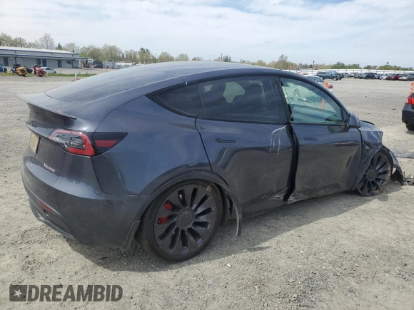 2021 Tesla Model Y Performance with VIN 5YJYGDEF2MF262273, listed as a Copart auction lot 50569245 with 90,879 mi miles and Salvage Title. Bid and sale history available at DreamBid. Image 3.