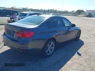 2013 BMW 3 Series 328i with VIN WBA3A5C50DF355734, listed as a IAAI auction lot 41629338 with 120,932 mi miles. Bid and sale history available at carsss.com. Image 4.