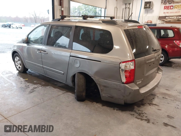 2010 Kia Sedona LX with VIN KNDMG4C31A6331565, listed as a IAAI auction lot 41860255 with 219,233 mi miles. Bid and sale history available at carsss.com. Image 3.