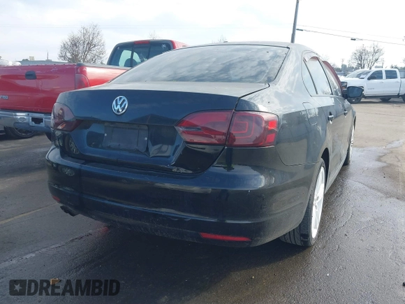 2011 Volkswagen Jetta Sedan SE w/Convenience & Sunroof PZEV with VIN 3VWDZ7AJXBM047797, listed as a IAAI auction lot 41244245 with 163,941 mi miles. Bid and sale history available at carsss.com. Image 4.