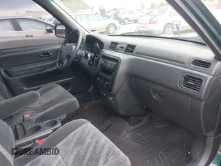 2001 Honda CR-V LX z VIN JHLRD18461C020958, wystawiony jako IAAI lot #42373553 z przebiegiem 195 086 mil mil oraz . Historia ofert i sprzedaży dostępna na DreamBid. Obrazek 5.