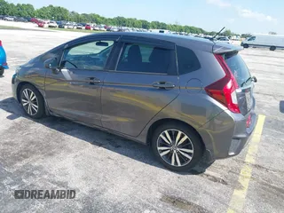 2015 Honda Fit EX-L z VIN 3HGGK5H89FM730013, wystawiony jako IAAI lot #42673309 z przebiegiem 142 660 mil mil oraz . Historia ofert i sprzedaży dostępna na DreamBid. Obrazek 3.