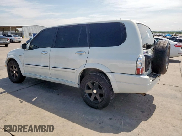2003 Suzuki XL7 Touring with VIN JS3TY92V334105374, listed as a Copart auction lot 64013375 with 177,939 mi miles and Salvage title. Bid and sale history available at DreamBid. Image 2.
