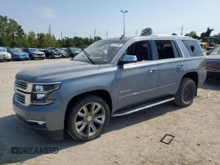 2015 Chevrolet Tahoe LTZ with VIN 1GNSKCKC4FR642387, listed as a Copart auction lot 68716334 with 154,631 mi miles and Salvage title. Bid and sale history available at DreamBid. Image 1.
