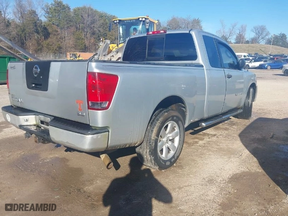 2006 Nissan Titan SE with VIN 1N6BA06A36N545818, listed as a IAAI auction lot 41618629 with 157,620 mi miles. Bid and sale history available at carsss.com. Image 4.