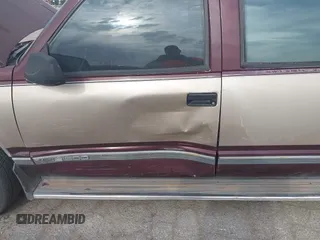 1993 GMC Suburban with VIN 1GKEC16KXPJ734150, listed as a IAAI auction lot 42114021 with 254,501 mi miles and . Bid and sale history available at DreamBid. Image 6.