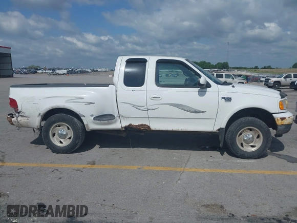 2000 Ford F-150 z VIN 2FTRX08W3YCA83858, wystawiony jako IAAI lot #42569957 z przebiegiem Nie podano mil oraz . Historia ofert i sprzedaży dostępna na DreamBid. Obrazek 13.