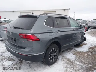 2020 Volkswagen Tiguan SE with VIN 3VV2B7AX7LM066135, listed as a IAAI auction lot 41349357 with 106,575 mi miles. Bid and sale history available at carsss.com. Image 4.