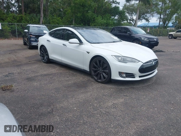2013 Tesla Model S Performance with VIN 5YJSA1DP9DFP04076, listed as a IAAI auction lot 42185465 with 179,640 mi miles and . Bid and sale history available at DreamBid. Image 1.