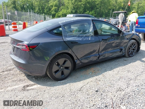 2023 Tesla Model 3 with VIN 5YJ3E1EA2PF566047, listed as a IAAI auction lot 42481008 with 21,143 mi miles and . Bid and sale history available at DreamBid. Image 4.