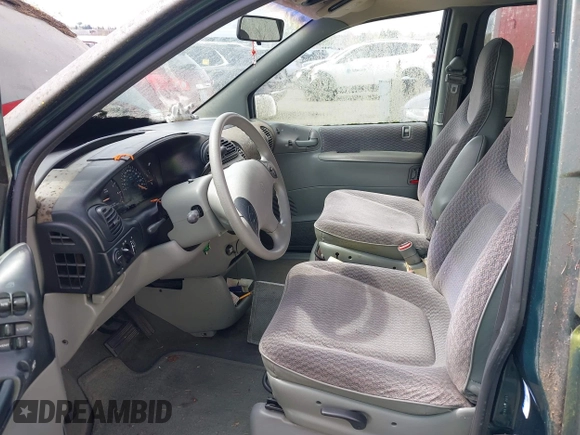 1999 Plymouth Voyager Grand SE z VIN 1P4GP44G0XB579719, wystawiony jako IAAI lot #41981925 z przebiegiem 163 940 mil mil oraz . Historia ofert i sprzedaży dostępna na DreamBid. Obrazek 5.