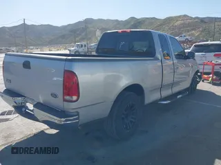 1999 Ford F-150 XL with VIN 1FTRX17L3XKB76368, listed as a IAAI auction lot 41959746 with Not Provided miles. Bid and sale history available at carsss.com. Image 4.
