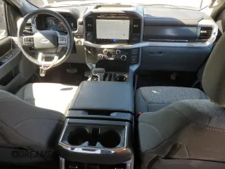 2023 Ford F-150 Lightning Pro with VIN 1FTVW1EL8PWG10894, listed as a Copart auction lot 50988655 with 34,020 mi miles and Salvage Title. Bid and sale history available at DreamBid. Image 8.