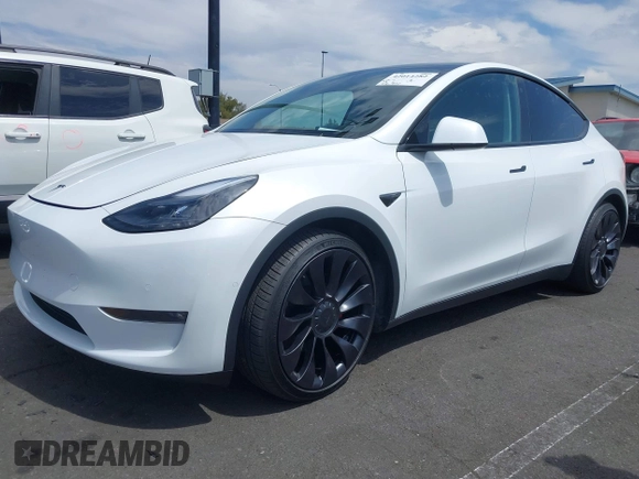2022 Tesla Model Y Performance with VIN 7SAYGDEF8NF407109, listed as a IAAI auction lot 42014282 with 24,937 mi miles and . Bid and sale history available at DreamBid. Image 19.