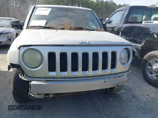 2013 Jeep Patriot Sport with VIN 1C4NJRBB6DD262920, listed as a IAAI auction lot 41779403 with 145,444 mi miles and . Bid and sale history available at carsss.com. Image 6.